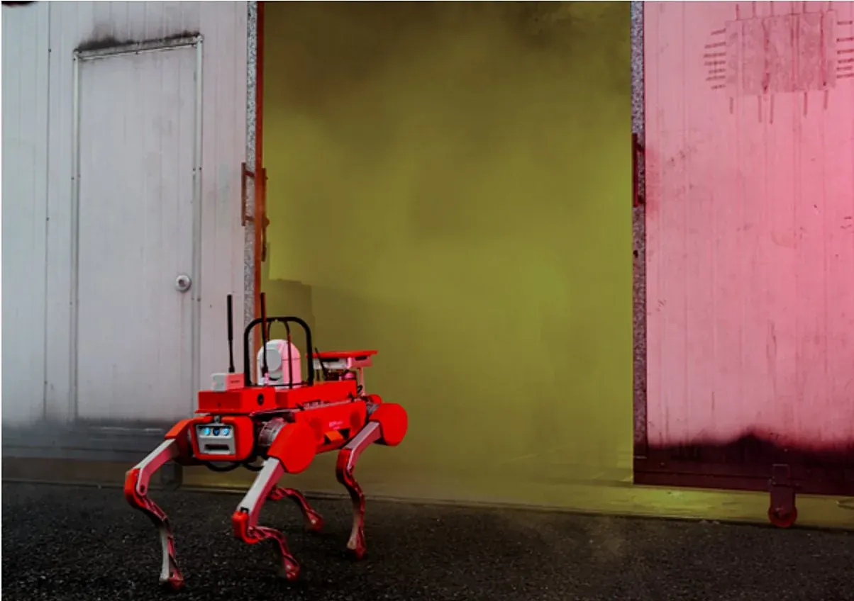 Firefighting quadruped robot entering a smoke-filled compartment for reconnaissance
