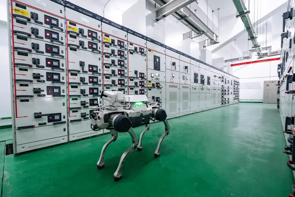 Quadruped inspection robot on patrol in an industrial plant corridor